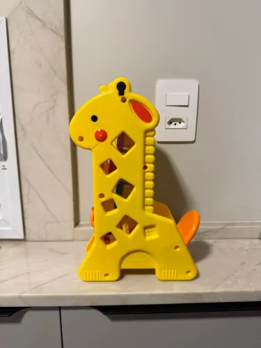 Brinquedo Fisher-Price Girafa com blocos