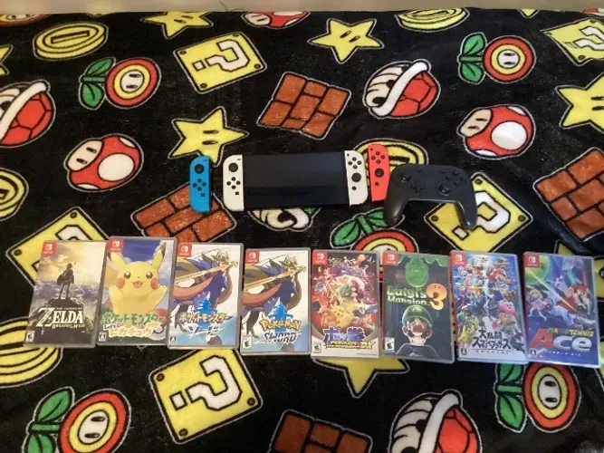 Nintendo Switch+Joycons+ Pro controller+ 8 jogos (1 repetido)
