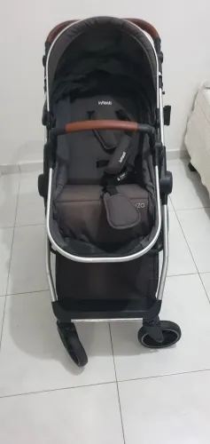 Carrinho de bebê e bebê conforto