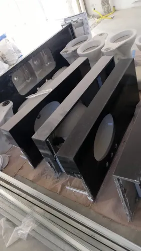 Pias de granito com cubas deca, caixa acoplada porta balcao