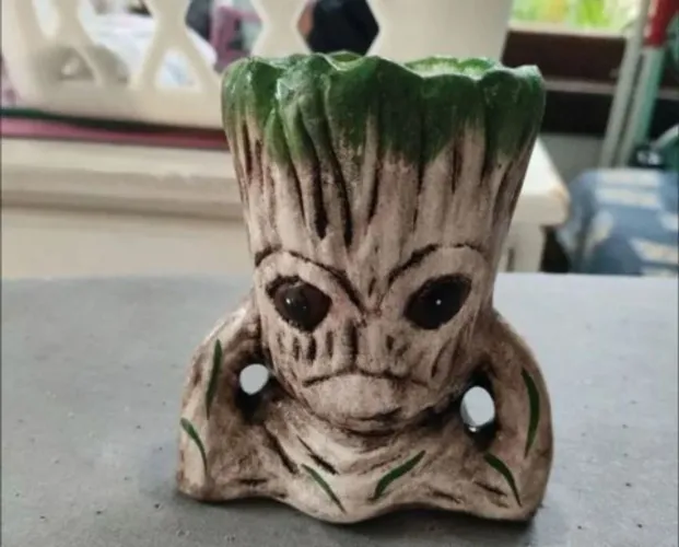 vaso de planta de gesso do groot