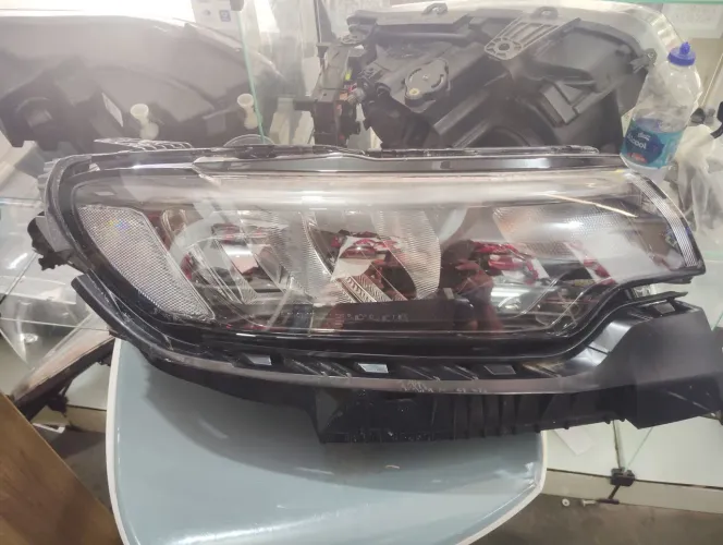 Farol do jeep Compass Lando direito 2023