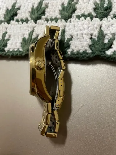 Relógio technos dourado 