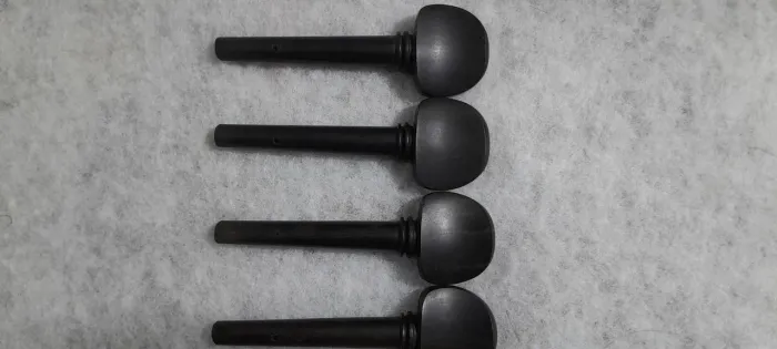 Cravelhas Para Violoncelo Ébano - Olho de Paris