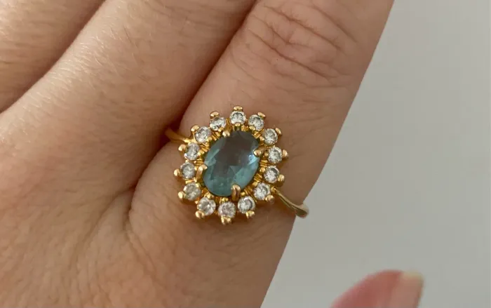 Anel Rommanel pedra azul com zircônias
