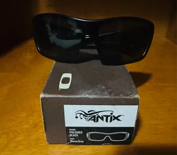 Óculos Novo Oakley Antix Polished Black Warm Grey Importado Original