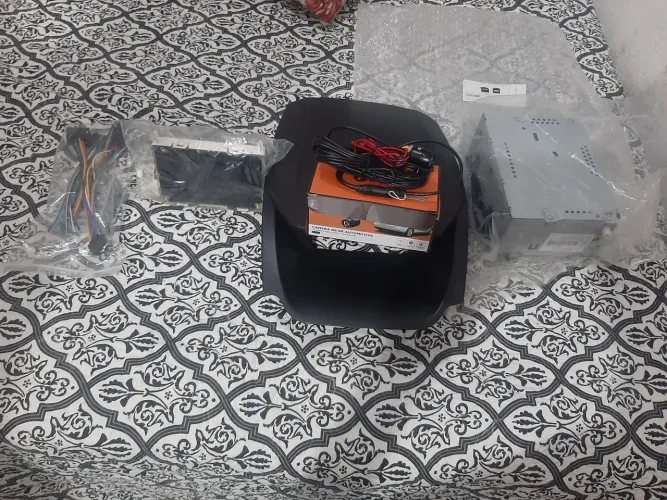 Parte superior do rádio com a tela de instrução do veículo da Ecosport 2014