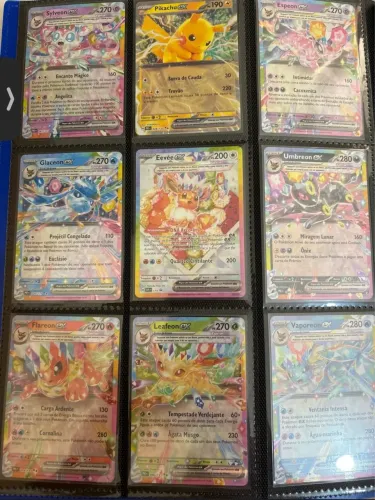 30 pacotinhos da Copa do mundo e 35 cartas ex e Full Art