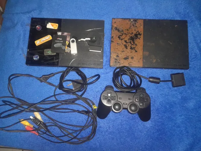 Vendo ou troco/ ps2 com defeito simples 