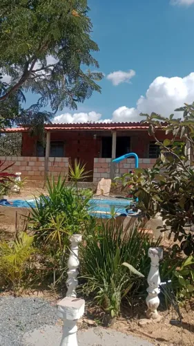 Vendo ou troco sítio  em Caetanópolis  por carro ou casa AP    
