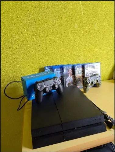 Play4 fat 500gb acompanha 6 jogos e 2 controles (1 original e 1 paralelo)