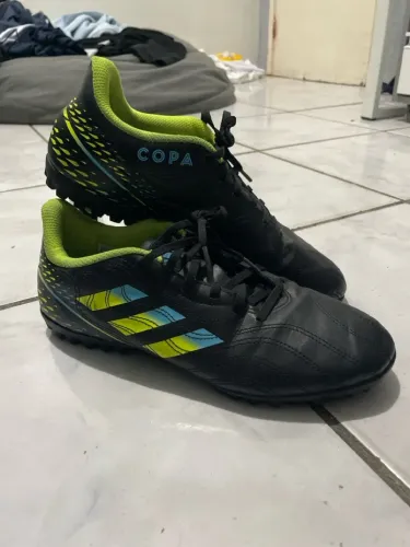 Chuteira adidas copa Sense.4 Society