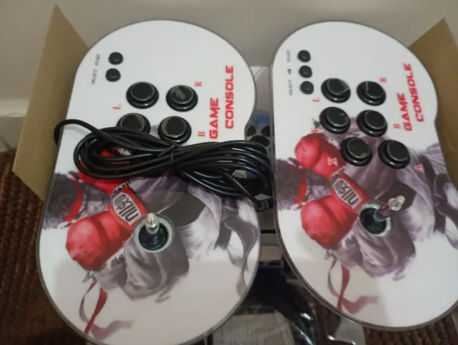 Video game ? novo vai com 2 controle, uma cartão de memória com mais de 1000 jogos.