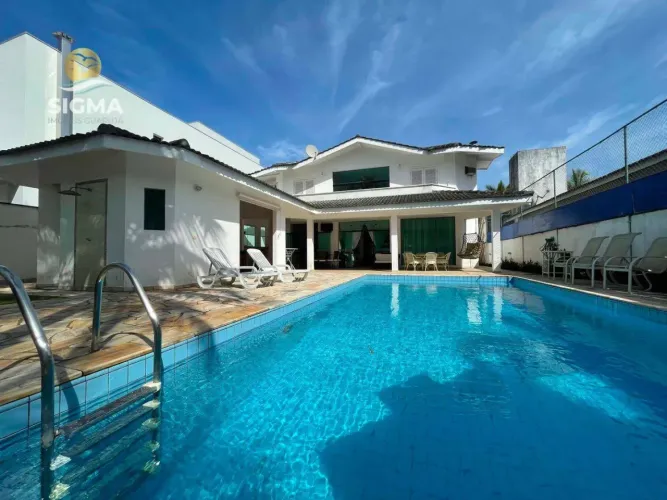 Casa com 4 dormitórios à venda, 345 m² por R$ 2.350.000 - Jardim Acapulco - Guarujá/SP.