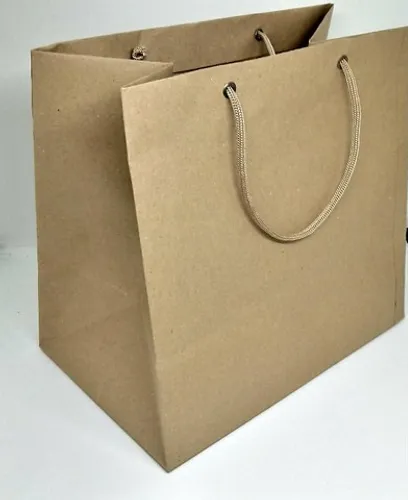 Sacola ovo de pascoa 25x24x16 Kraft 110 gr. com Ilhós - Kit c/50 unidades