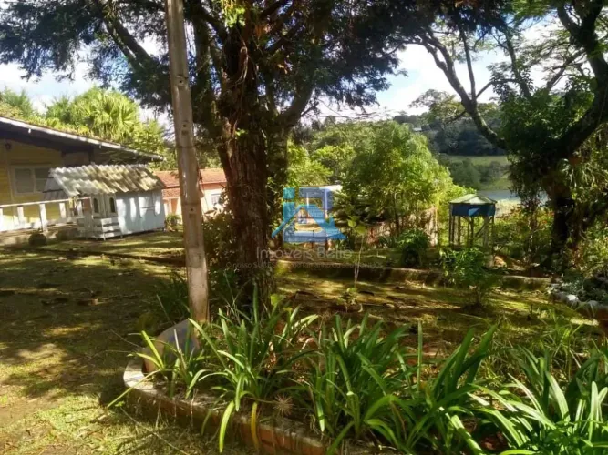 Chácara com 4 dormitórios à venda, 5000 m² por R$ 1.060.000,00 - Condomínio Itaembu - Itat