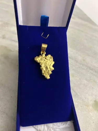 Pingente em ouro 18k (600 reais o grama)