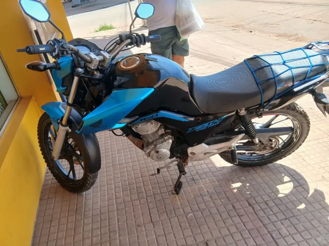 Moto Honda 160 fan total flex.
