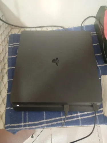 Ps4 slim 1 tera de memória