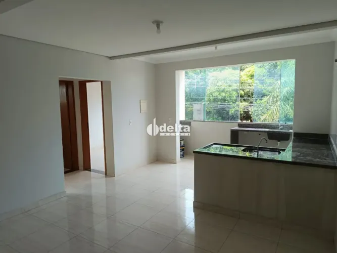 Apartamento com 2 quartos sendo 1 suíte, disponível no bairro Laranjeiras Uberlândia-MG