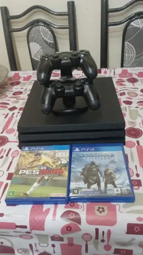Vendo PlayStation 4 dois controles dois jogos 