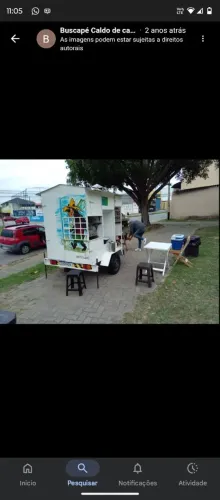 Carrinho de água de coco e caldo de cana