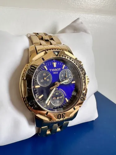 Relógio Tissot PRS200 dourado original 