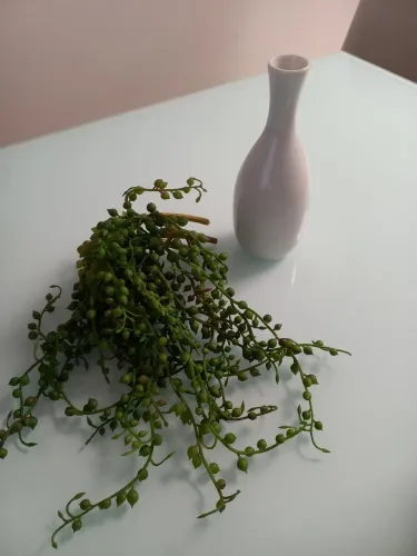Vaso decorativo com planta artificial realista