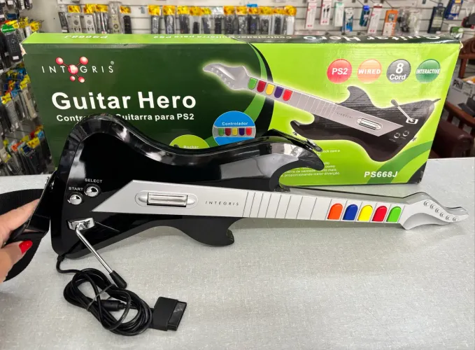 Guitarra Guitar Hero PS2 Integris Com Fio na Caixa - Relíquia Anos 2000