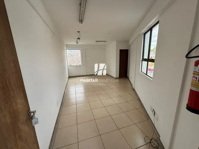 Sala para locação em prédio moderno com 23m2 no bairro Santa Amélia.