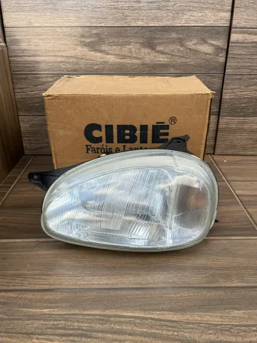 Farol Corsa 94/99 Original Cibié Lado Esquerdo