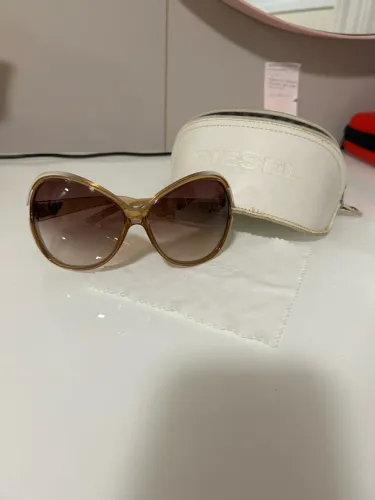 Óculos modelo vintage feminino DS0079 CNGYY da Diesel original.