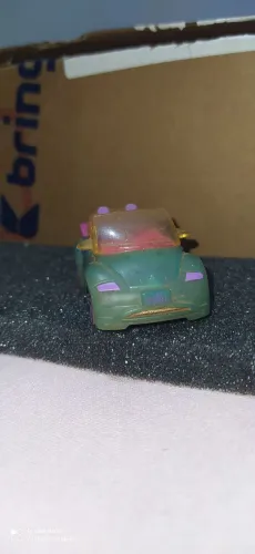 Miniatura Polly com marcas de uso e poeira 