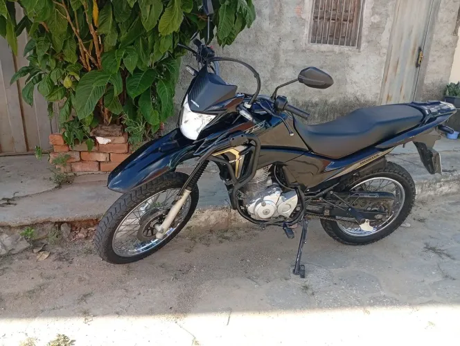 Moto muito econômica troco por alguma coisa do meu enterrese