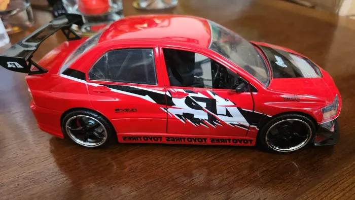Miniatura Velozes e Furiosos Lancer Evolution 1:24.