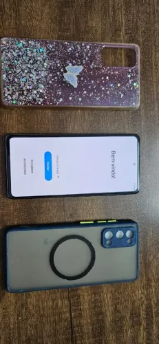 Celular S20FE, seminovo, 128GB, cor cloud navy (azul escuro). Não acompanha acessórios.