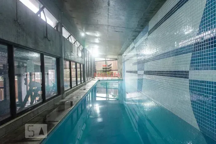 Apartamento com 2 dormitórios, sala, cozinha americana com área de serviço, varanda envidr