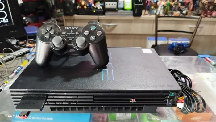 Playstation 2 com moldem controle original bom estado ac trocas.