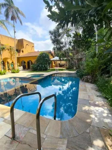 Casa com 5 dormitórios à venda, 604 m² por R$ 7.500.000,00 - Riviera Módulo 20 - Bertioga/