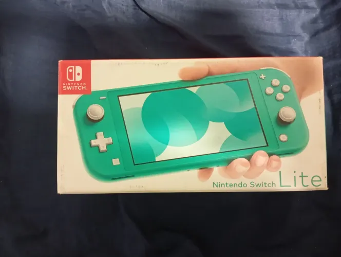 Nintendo Switch lite turquesa seminovo + super Mario odyssey