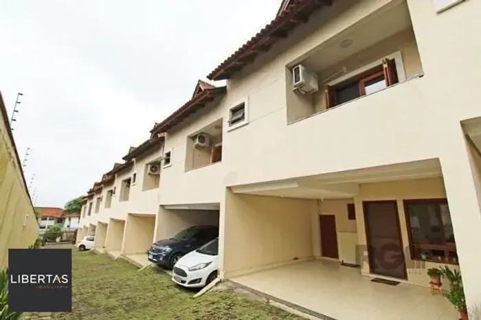 Casa Condomínio em Porto Alegre, no bairro Tristeza, com 3 dormitório(s), à vend