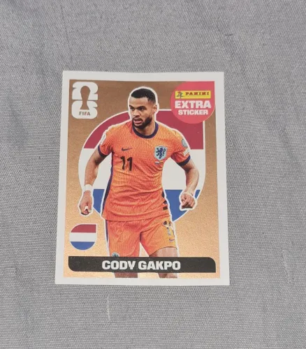 Figurinha extra sticker Cody gakpo bronze 