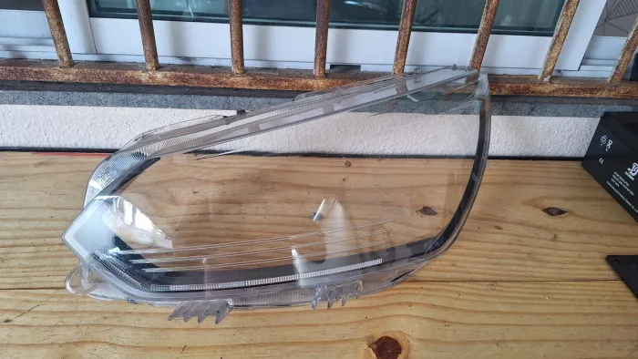 Lente farol peugeot 208 2021> Original lado do motorista