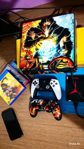 Vendo ps4 slim 500 GB com três jogos mídia física vai dois controles