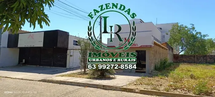 Sala Comercial com casas fundos