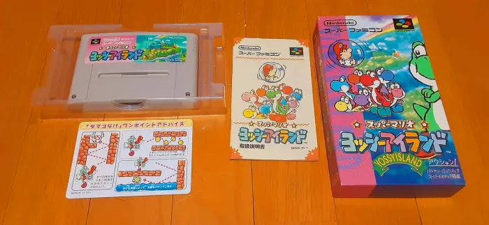 Yoshi's Island + Caixa e manual da versão japonesa da Super Nintendo<br>Na caixa,
