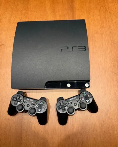 PS3 slim + 2 controles + 6 jogos
