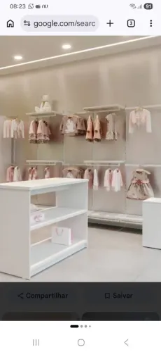 Vendo expositor de roupas comac na cor branca,ideal para lojas de roupas,boutiques.