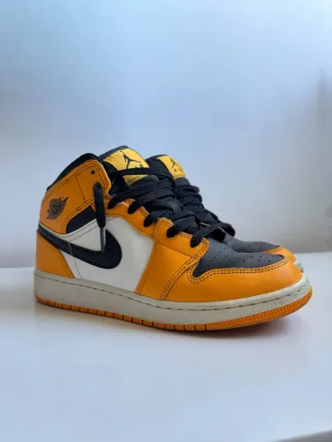 Tênis Jordan 1 Mid Taxi