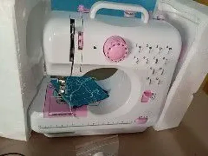Máquina de costura elétrica